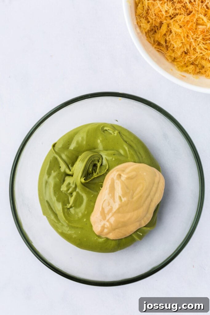 Golden Dubai Delight 6 A bowl of pistachio butter and tahini side by side, ready to be mixed, with toasted kataifi in background.