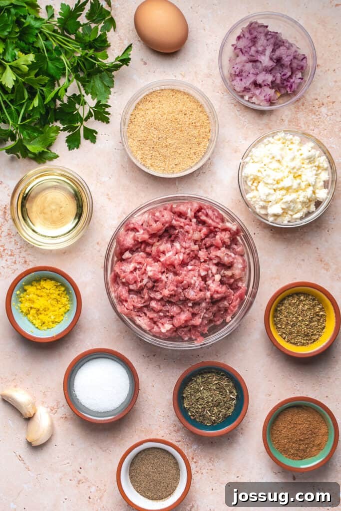 Overhead view of all ingredients for turkey feta meatballs arranged on a countertop