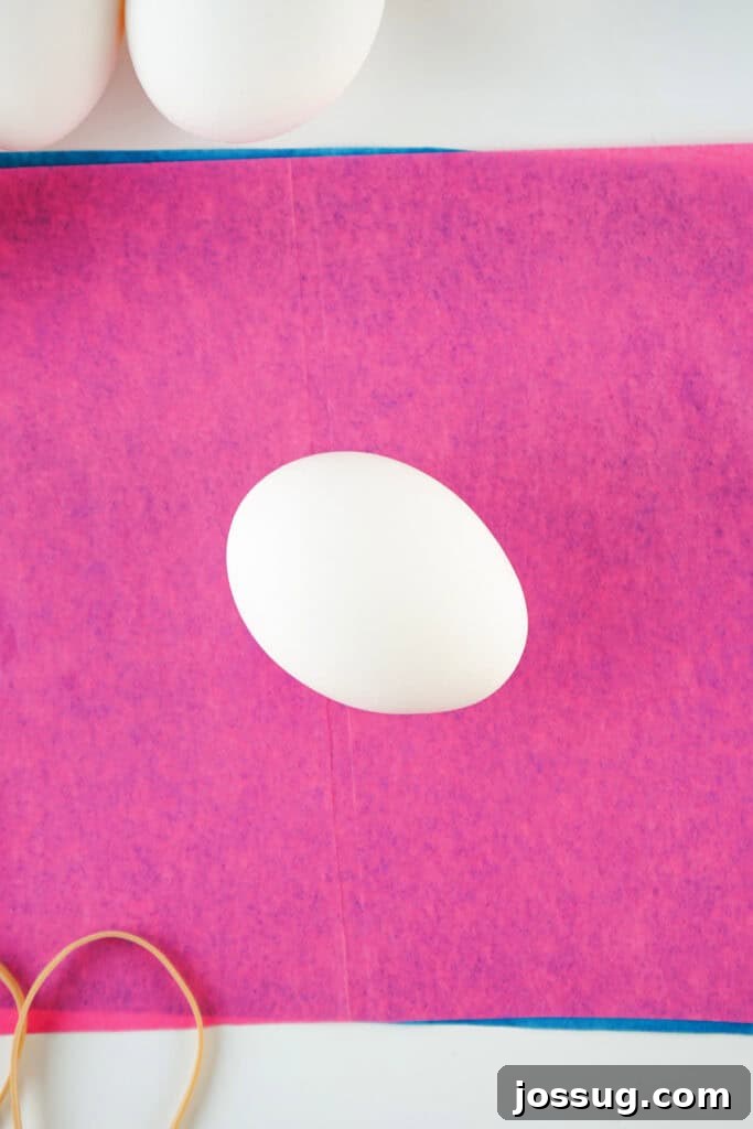 Watercolor Tissue Paper Easter Eggs 4 egg placed on sheets of tissue paper