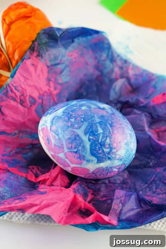 Watercolor Tissue Paper Easter Eggs 7 unwrapped tissue paper dyed easter egg showing the color transfer