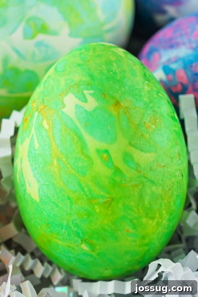 Watercolor Tissue Paper Easter Eggs 8 closeup of a green tissue paper dyed easter egg