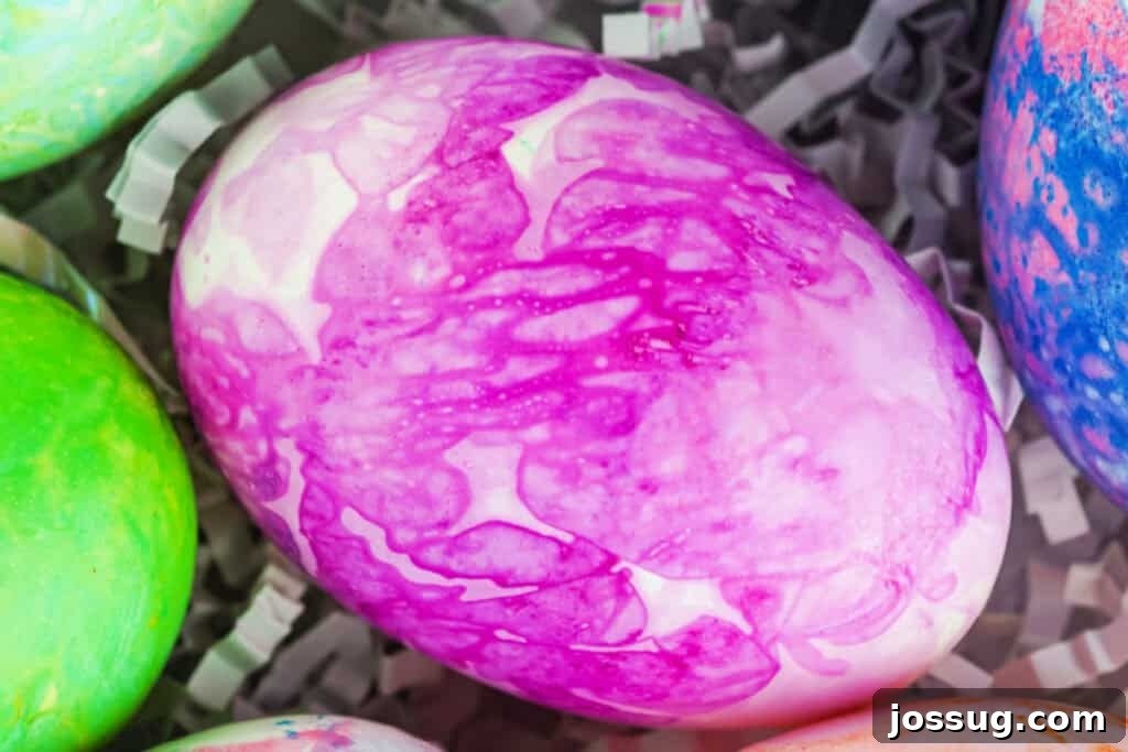 Watercolor Tissue Paper Easter Eggs 9 closeup of a pink tissue paper dyed easter egg