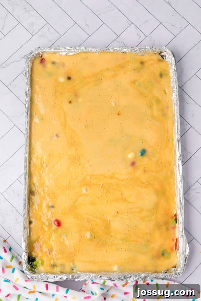 the candy mixture poured over the jelly bean to harden