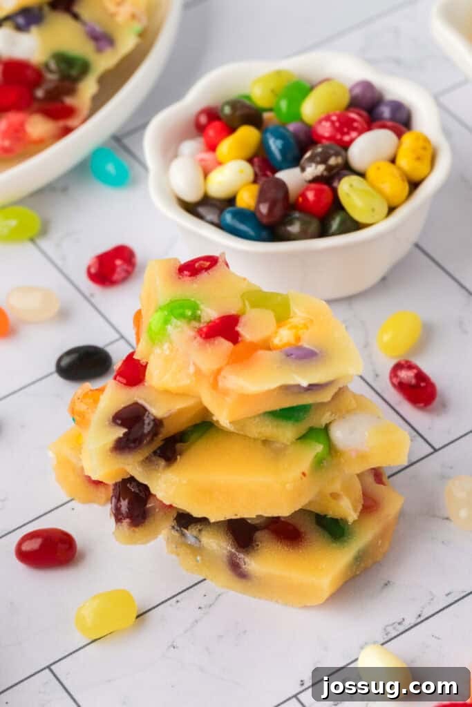 pieces of jelly bean brittle stacked on top of each other