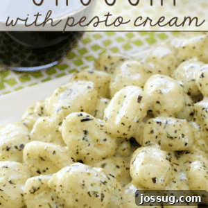 Gnocchi with Pesto Cream piled up on a plate, ready to be served.