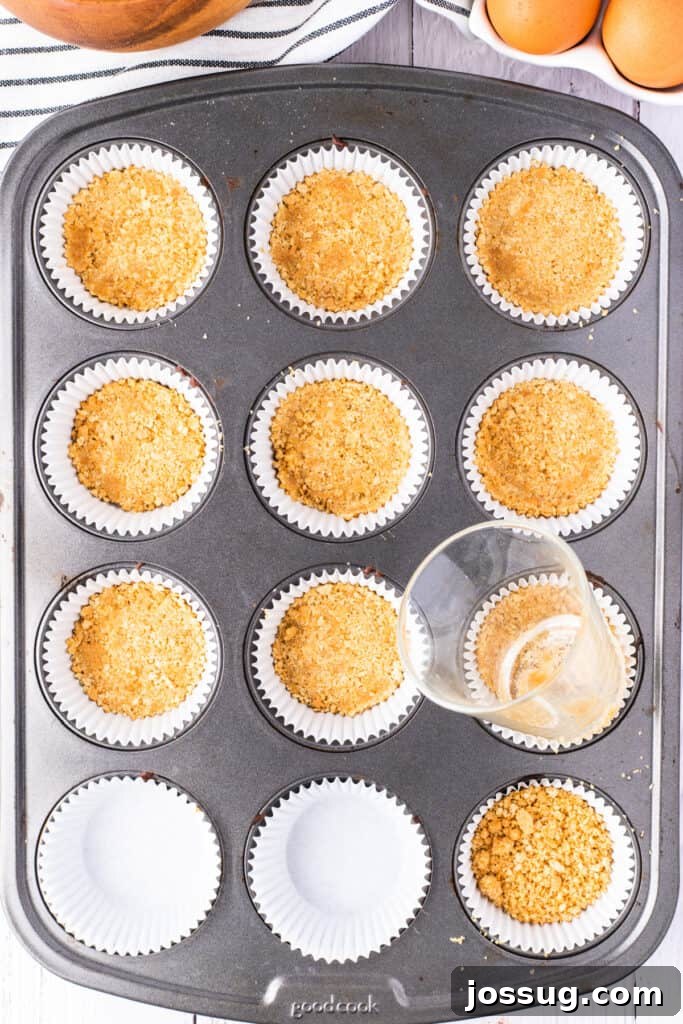 Zesty Mini Key Lime Cheesecakes 4 Graham cracker crusts pressed into cupcake liners with a small glass