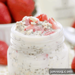 Creamy Strawberry Vanilla Overnight Oats 3 Strawberry Vanilla Overnight Oatmeal in a jar with fresh strawberries.