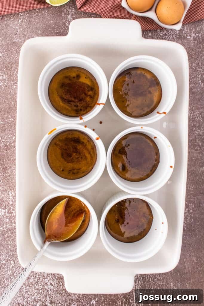 Caramel Flan Bites 7 Ramekins filled with caramelized sugar at the bottom, ready for custard to be poured in.
