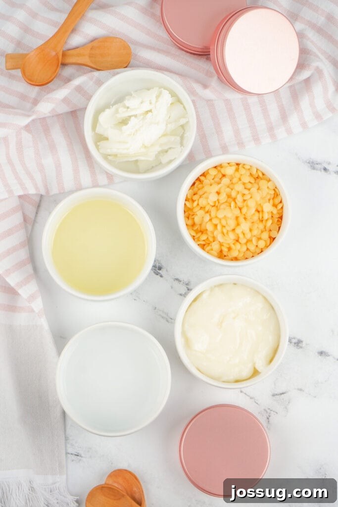 Happy Paws Balm 3 Ingredients for dog paw balm arranged in small white bowls with wooden spoons and pink metal tins. Highlighting the natural components.