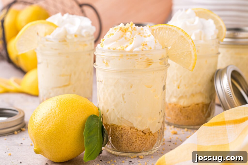 Zesty No-Bake Lemon Cheesecake Jars 6 Three beautifully presented no-bake lemon cheesecake jars, ready for serving