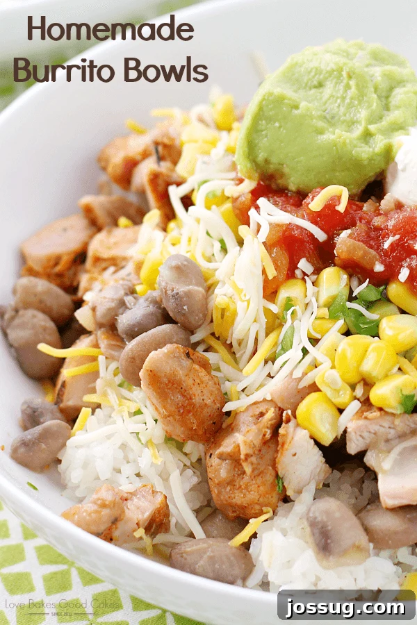 A vibrant homemade burrito bowl featuring fluffy cilantro lime rice, savory chipotle chicken, creamy ranchero beans, fresh corn salsa, and a dollop of homemade guacamole, all beautifully arranged in a white bowl.