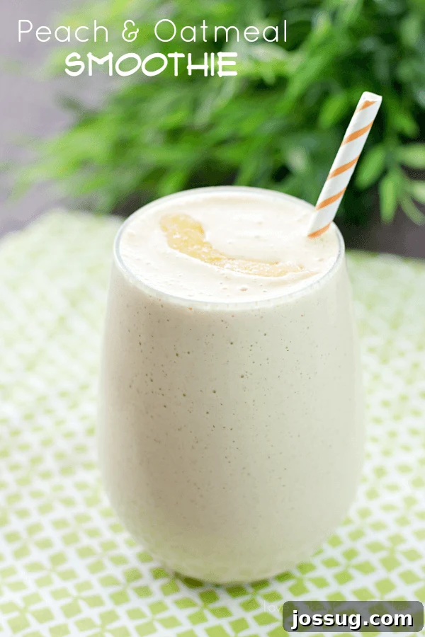 Velvet Peach Oat Dream 2 Vibrant Peach & Oatmeal Smoothie in a clear glass with a straw, garnished with a fresh peach slice.