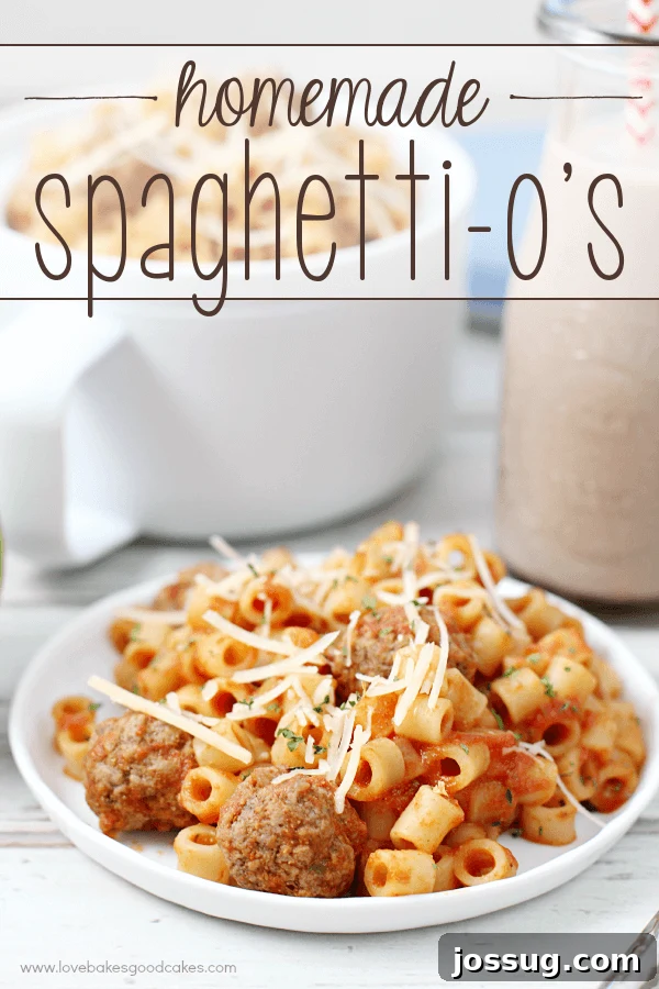 A white bowl filled with homemade spaghetti-o's, ready to be enjoyed.