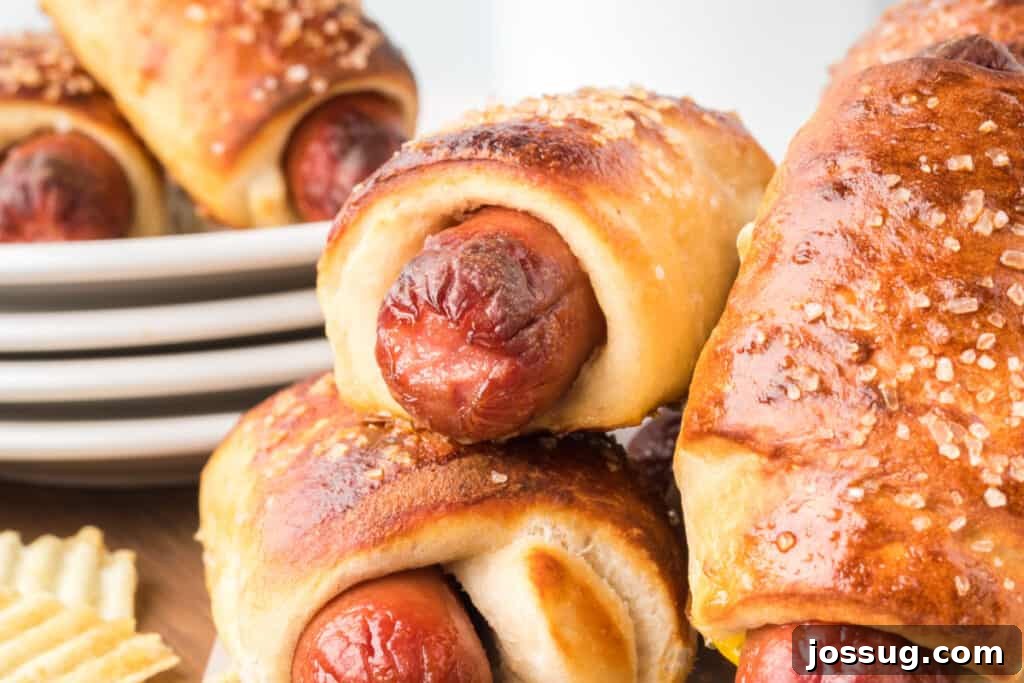 Homemade Pretzel Dogs in a Snap 11 A festive platter of pretzel dogs arranged for a game day celebration.