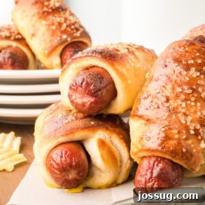 Homemade Pretzel Dogs in a Snap 12 Closeup of golden brown pretzel dogs, showing the crispy exterior.