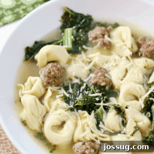 Italian Tortellini Soup in a white bowl.