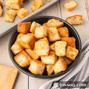 garlic parmesan croutons in bowl