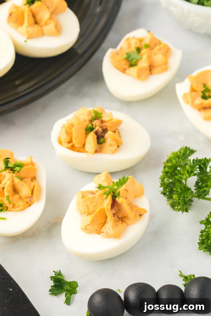 Smoky Chipotle Deviled Eggs 5 chipotle deviled eggs on table