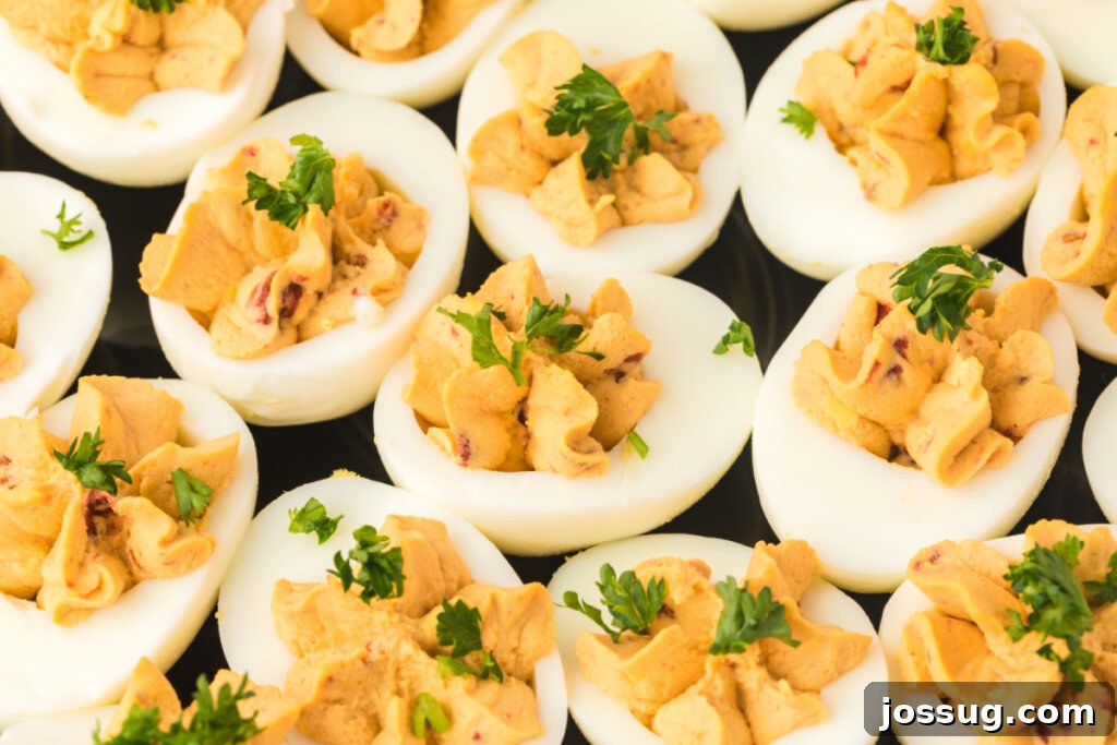 Smoky Chipotle Deviled Eggs 6 chipotle deviled eggs on platter