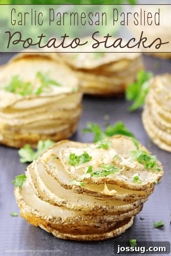 Golden brown Garlic Parmesan Parslied Potato Stacks on a cutting board, garnished with fresh parsley.