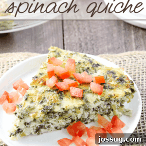 Crustless Spinach Quiche on a white plate with fresh tomatoes.