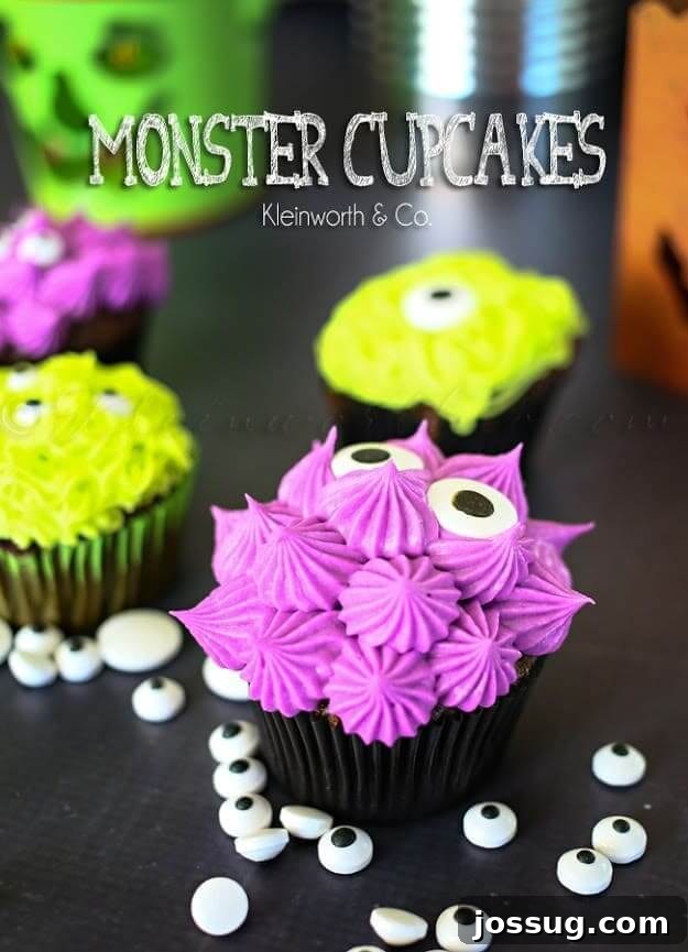 Whimsical monster cupcakes with colorful frosting and edible eyes, arranged on a table.