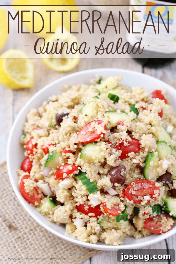 A vibrant Mediterranean Quinoa Salad served in a clean white bowl, showcasing colorful cherry tomatoes, green cucumber, and a sprinkle of feta cheese.