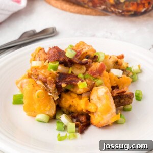 scoop of loaded potato and chicken casserole on plate
