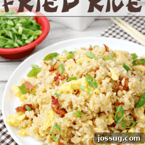 Bacon & Egg Breakfast Fried Rice on a white plate.