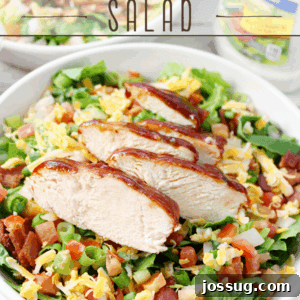 Jacked-Up Monterey Chicken Salad in a white bowl, close up.