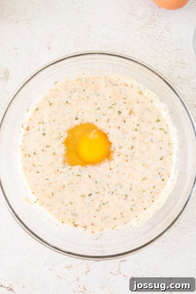 Pit Smoked Meatloaf 6 A well in the center of the milk and breadcrumbs mixture, with a fresh egg perfectly cracked and ready to be whisked in, forming a crucial binder.