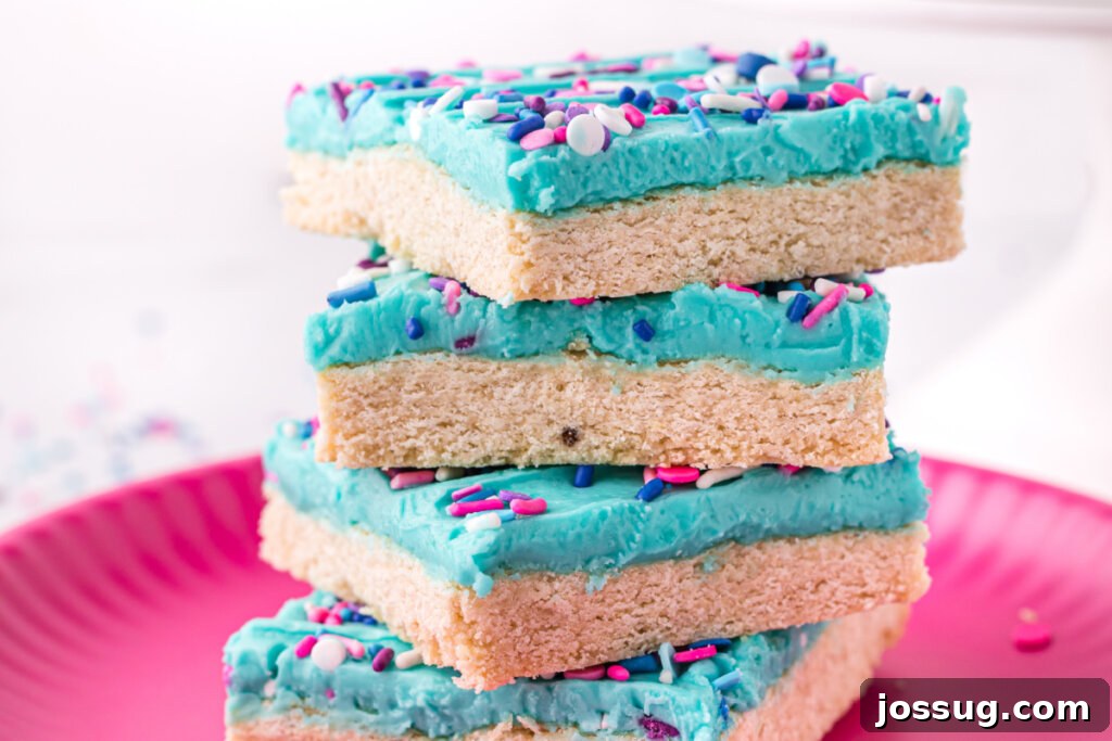 Stacked sugar cookie bars, ready to be enjoyed.
