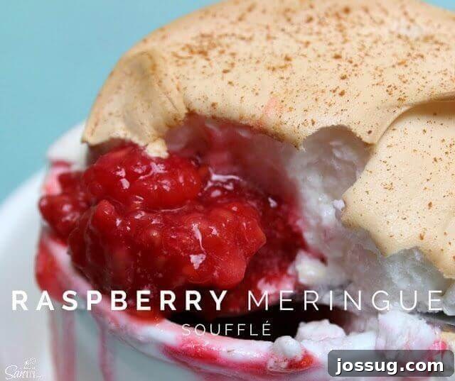 A Cloud of Raspberry Bliss 3 An inviting Raspberry Meringue Soufflé in a white bowl, showcasing its airy texture.