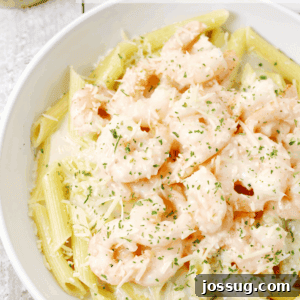 Parmesan Italian Shrimp with Pasta in a white bowl.