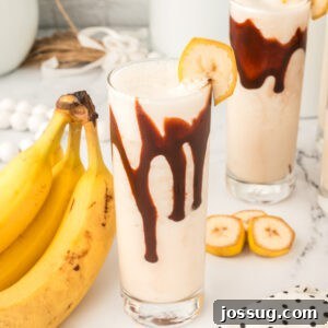 Close-up of a Dirty Banana Cocktail with chocolate syrup and banana garnish in a square format
