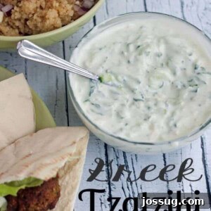 Refreshing Greek Tzatziki Dip 2 Greek Tzatziki Dip in a bowl with a spoon.