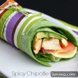 A vibrant Spicy Chipotle Chicken Wrap, featuring a delicious blend of seasoned chicken, fresh avocado, and crisp lettuce.