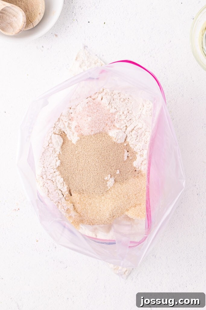 Dry ingredients added to a Ziploc bag for bread in a bag recipe