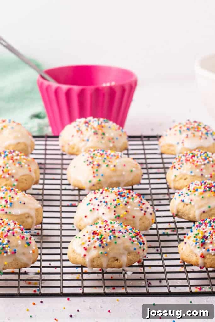 Pillowy Italian Ricotta Cookies 16 Beautifully glazed Italian Ricotta Cookies topped with rainbow sprinkles arranged on a rack