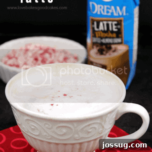 Dairy-Free Peppermint Mocha Latte in a cup with pieces of candy cane.