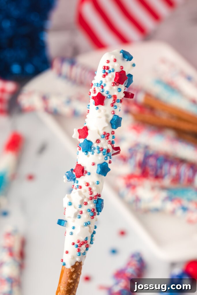 Close-up of beautifully decorated chocolate covered pretzel rods