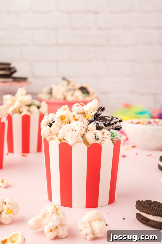 Funfetti Popcorn Treat 5 small striped party cup with popcorn snack mix