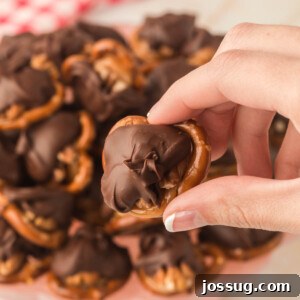 hand holding chocolate trurtle candy