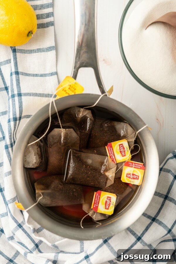 Southern Sweet Tea: Always Smooth and Sweet 6 tea bags steeping in a pot of water