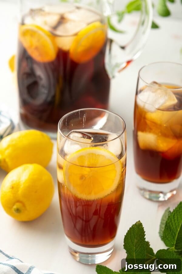 Southern Sweet Tea: Always Smooth and Sweet 9 two glasses of tea with lemon and a pitcher of tea in background