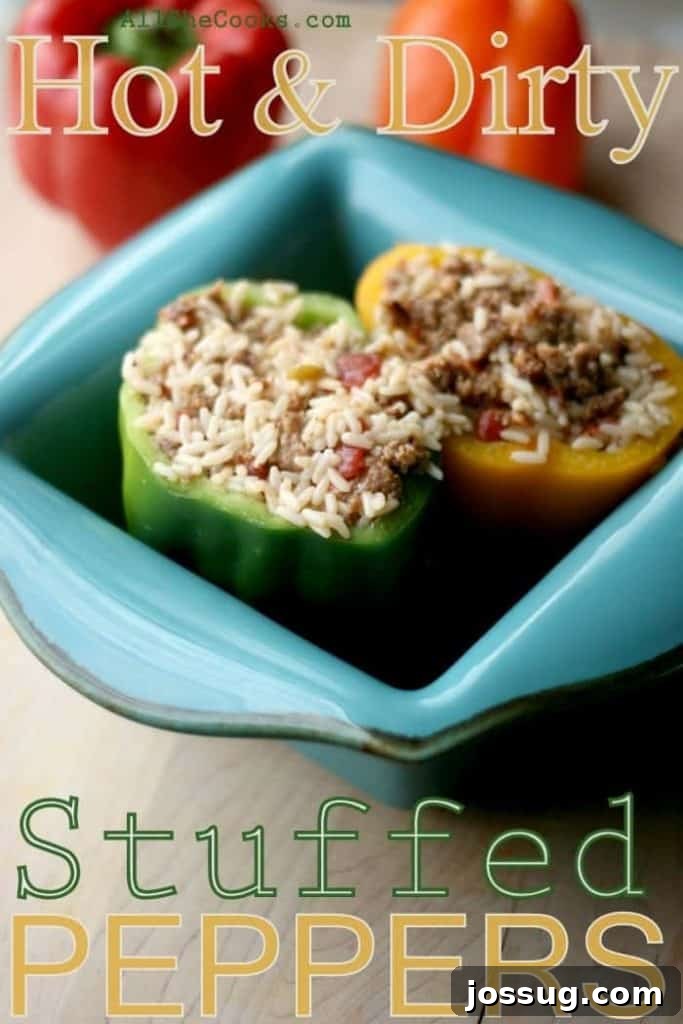 Delicious Hot and Dirty Stuffed Peppers baked to perfection, with melted golden cheese on top, ready to serve.