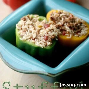 Close-up of baked Hot and Dirty Stuffed Peppers with melted mozzarella cheese.