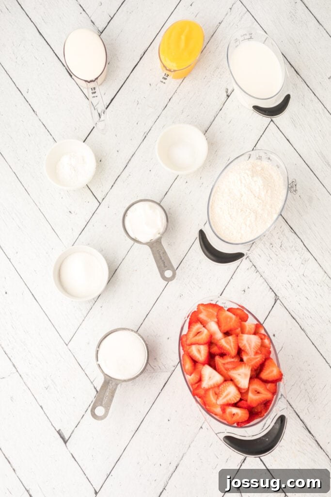 A vibrant flat lay showcasing ingredients for Strawberry Shortcake: fresh sliced strawberries, granulated sugar, all-purpose flour, lemon curd, and a bowl of butter, ready for baking. The scene emphasizes fresh, quality components.