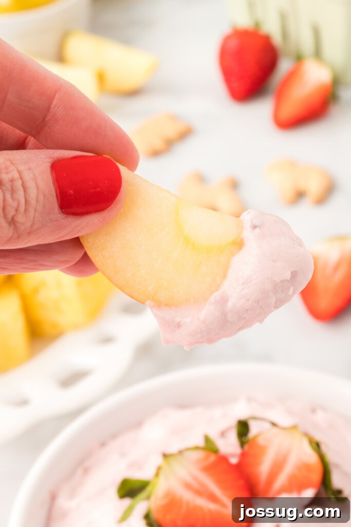apple slice with strawberry cream cheese dip