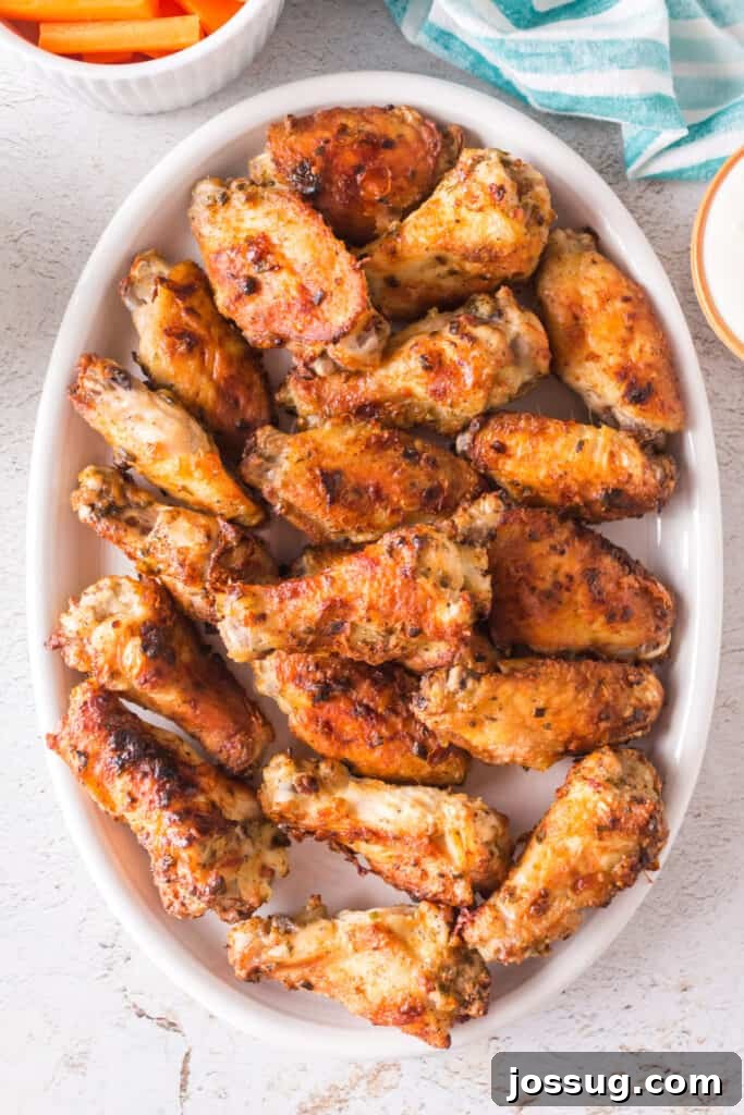 Crispy Air Fryer Ranch Wings 12 Platter of crispy golden ranch chicken wings served with carrot sticks and dipping sauce
